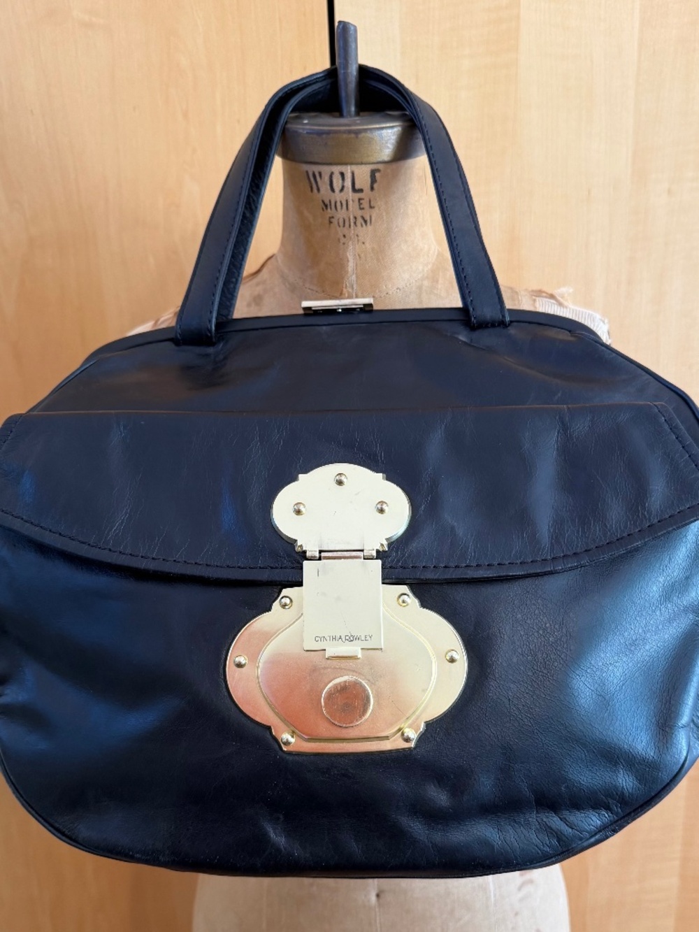 Vintage Cynthia Rowley Black Leather Handbag with Stunning Lock Closure